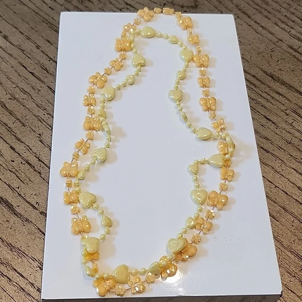 Kids play necklaces orange and yellow